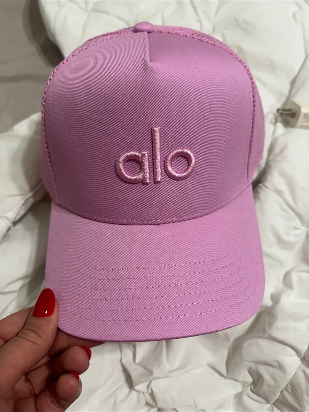 Alo pink trucker hat